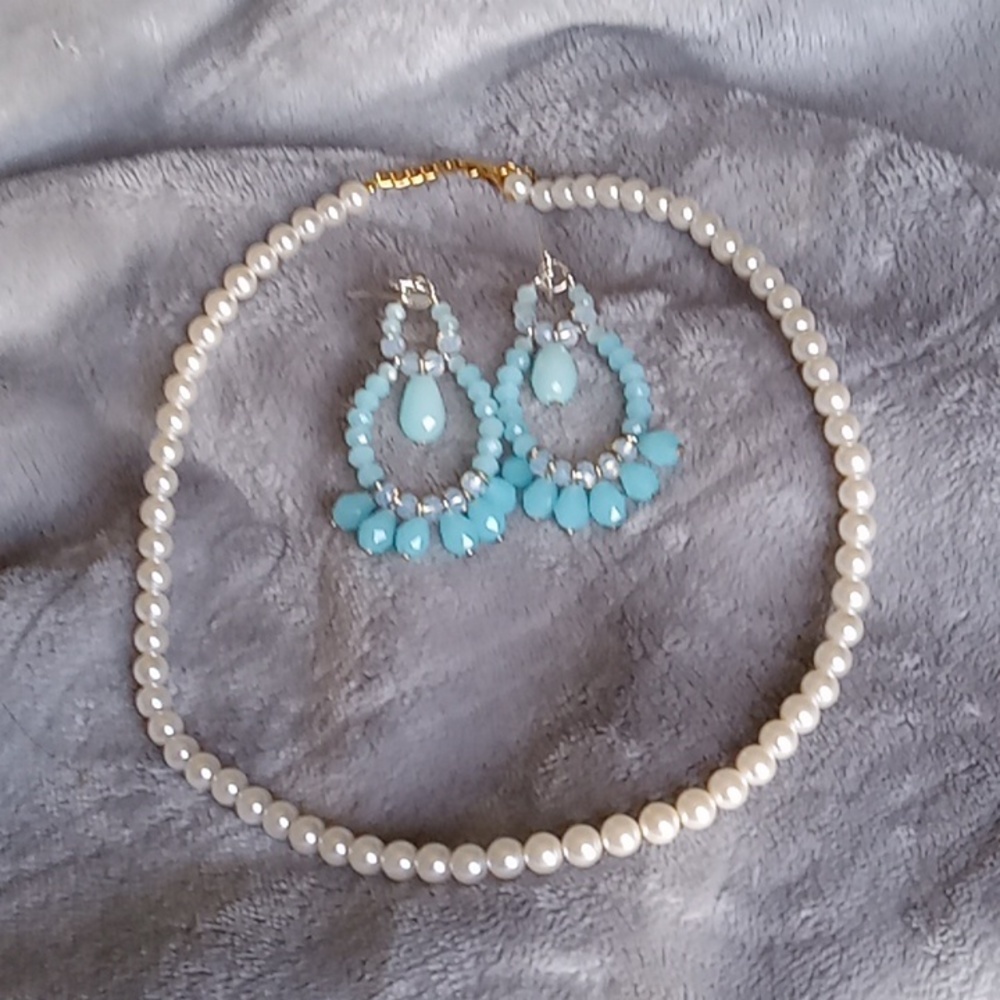 Pair of handmade earrings, light blue, and faux pearls.